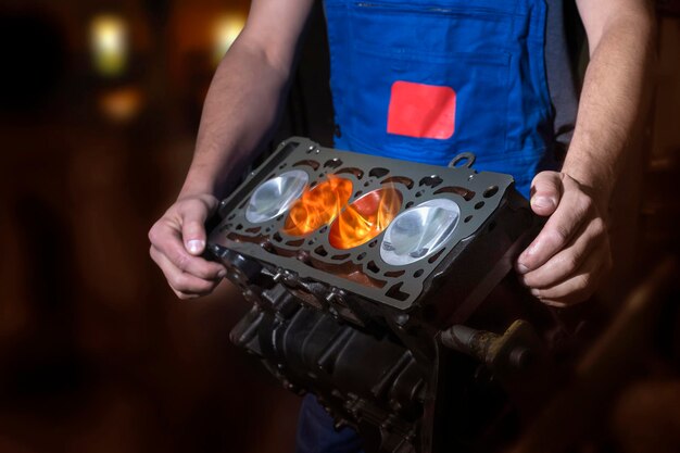 auto-mechanic-working-garage-burning-fire-flame-engine-piston-repair-service